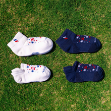 Arctic White Low sock, Arctic White Ankle sock, Midnight Blue Low sock, Midnight Blue Ankle sock (each with a red, white, and blue stars and stripes patterns)