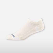 Off-white low sock with grey background.